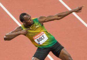 Usain Bolt lightening bolt post after winning olympic race