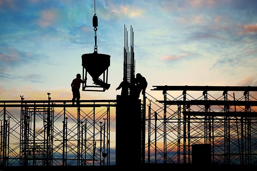 manual workers doing construction in the field