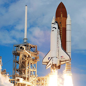 the space shuttle discovery and its seven member STS-120 crew