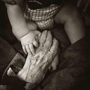 grandma and grandchild holding hands