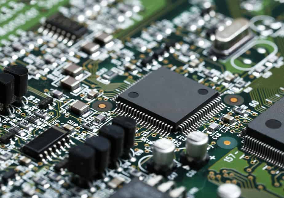closeup of electronic circuit board with CPU microchip electronic components